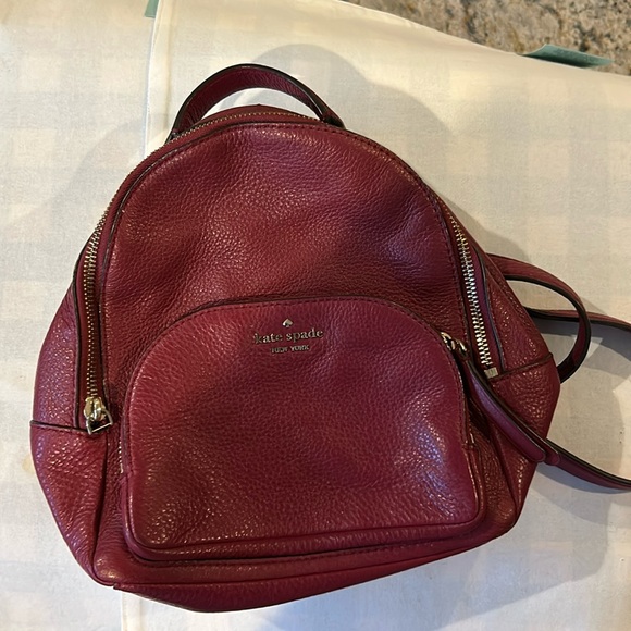 kate spade Handbags - Kate, spade wine colored back pack in pebbled grain leather Beautiful lining